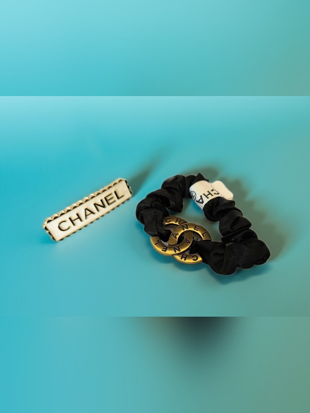 CHANEL Black Scrunchie with Gold Interlocking CC Medallion & Enamel Hair Clip